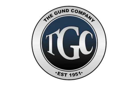 Logo de The Gund Company, cliente de MZS Colectores